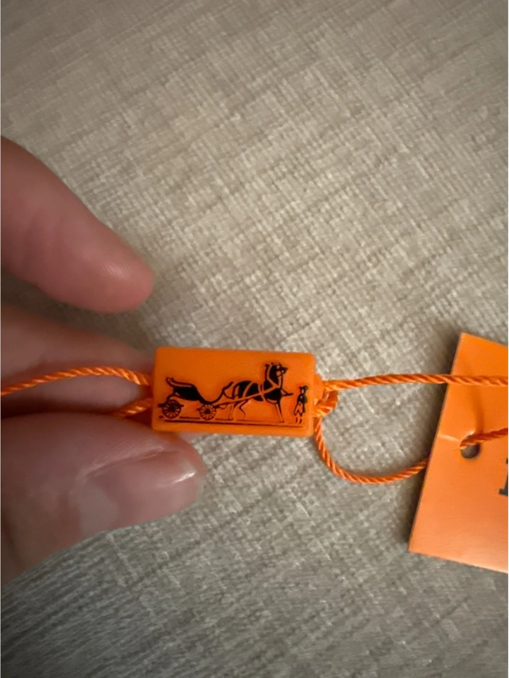 Hermès Paris Orange Hang Tag with String